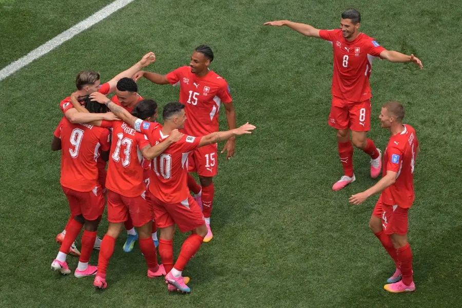 Switzerland players celebrate during their 4-1 victory over Bosnia and Herzegovina in a FIFA World Cup qualifier.