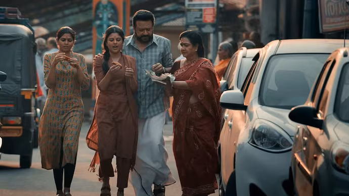 Jayaram and Urvashi in Parimala and Co Malayalam movie